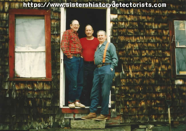 Left to Right -  Milton Inman, Vance Bacon and Vernon Inman  Albany, Maine hunting camp.