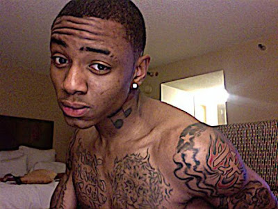 soulja boy tattoos. gun tattoo#39;s. Snoop Dogg