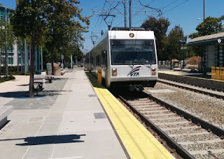 VTA light rail train pulling into station, Sunnyvale, California