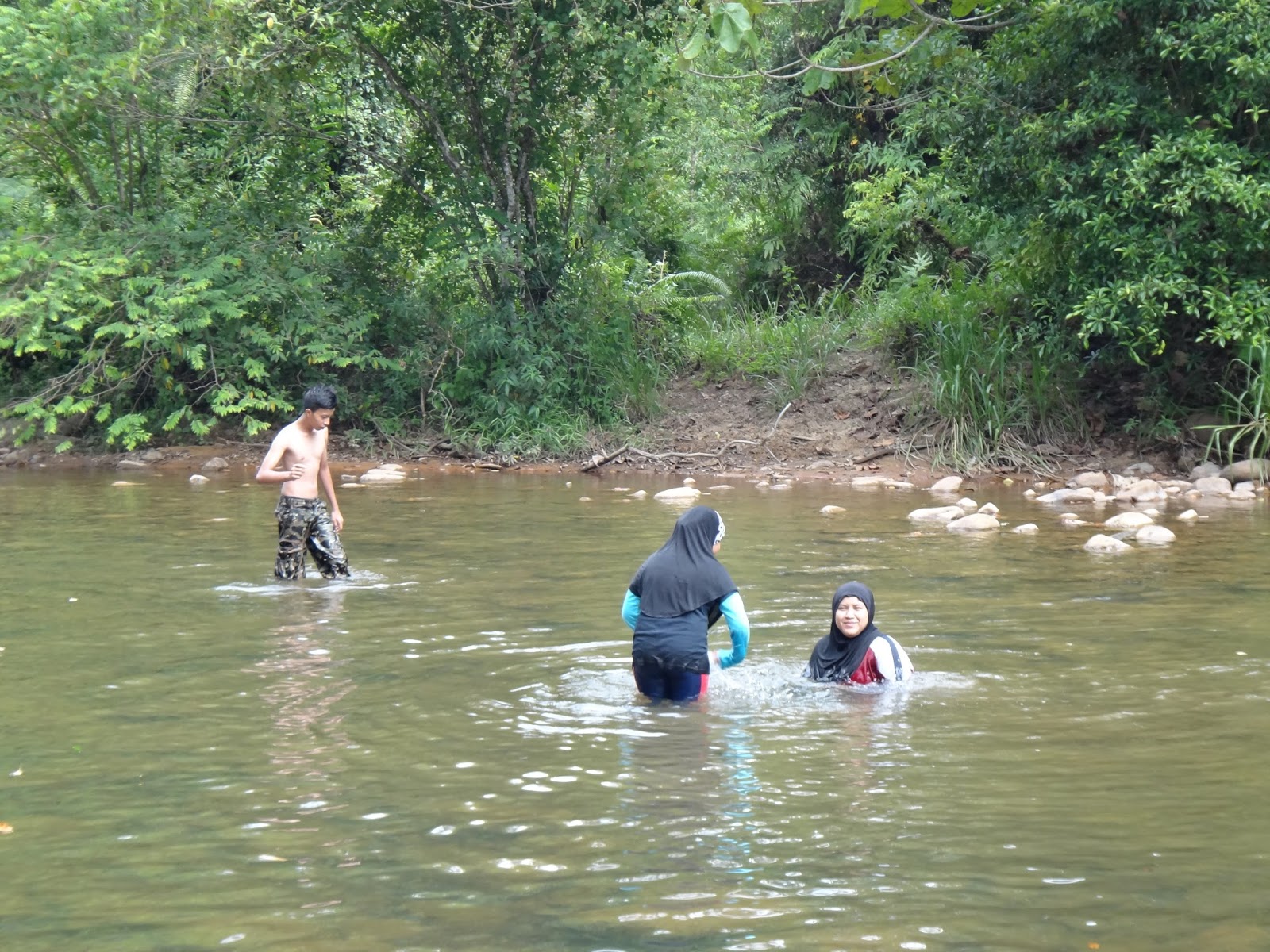 after lunch the juveniles went for a dip in the river nearby