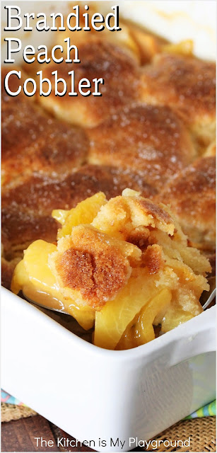 Brandied Peach Cobbler ~ With its sugar cookie-type topping & flavor hit from brandy in the peach filling, this is the BEST fresh peach cobbler around! It's the perfect way to enjoy those deliciously fresh summer peaches.  www.thekitchenismyplayground.com