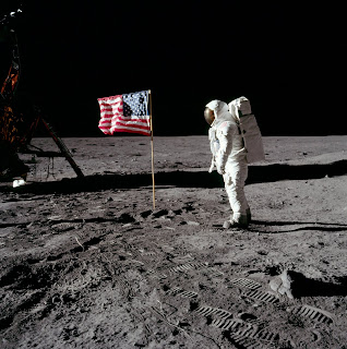 Two astronauts placed an American flag on the Moon’s surface during a television broadcast of the event.