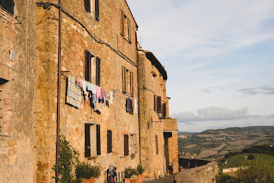 Pienza, town walls, Tuscan countryside, washing