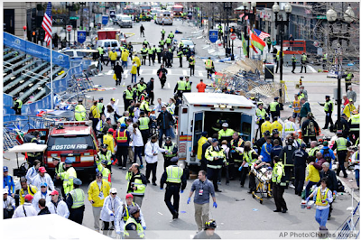 bombs explode at the finish line of the Boston Marathon