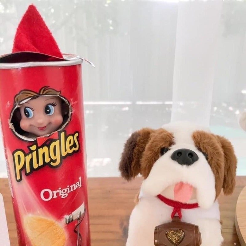 elf popping out of pringles can