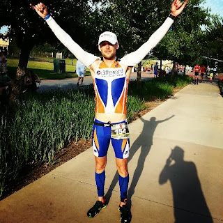 I stopped my Ironman run to proudly point both pinkies to the sky with a smile on my face as I start the final lap at Ironman Texas