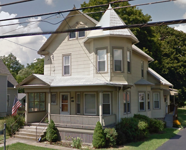 Sears Maytown: turret sided two-story farmhouse with front porch and bay window on the front and side