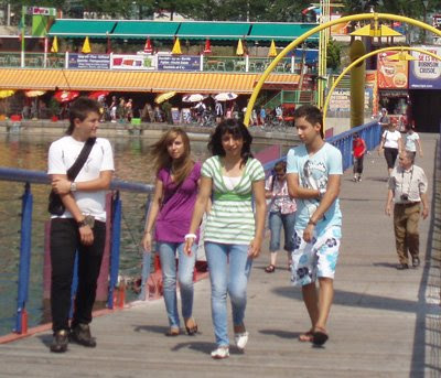 Young people crossing bridge