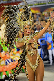 The greatest party on Earth': Rio Carnival reaches its breathtaking climax as thousands of scantily-clad samba dancers gyrate through the streets in an explosion of music and colour.
