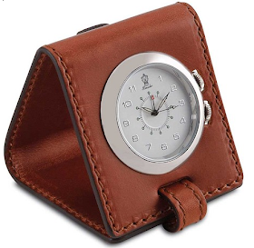 travel alarm clock in leather casing