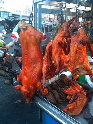 Red pig for sale on the street, Phnom Penh, Cambodia