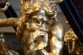 Triton detail on Gold State Coach at the Royal Mews, Buckingham Palace