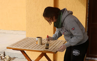 Staining up the patio furniture