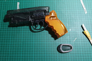 Water Pistol with butt plate removed.