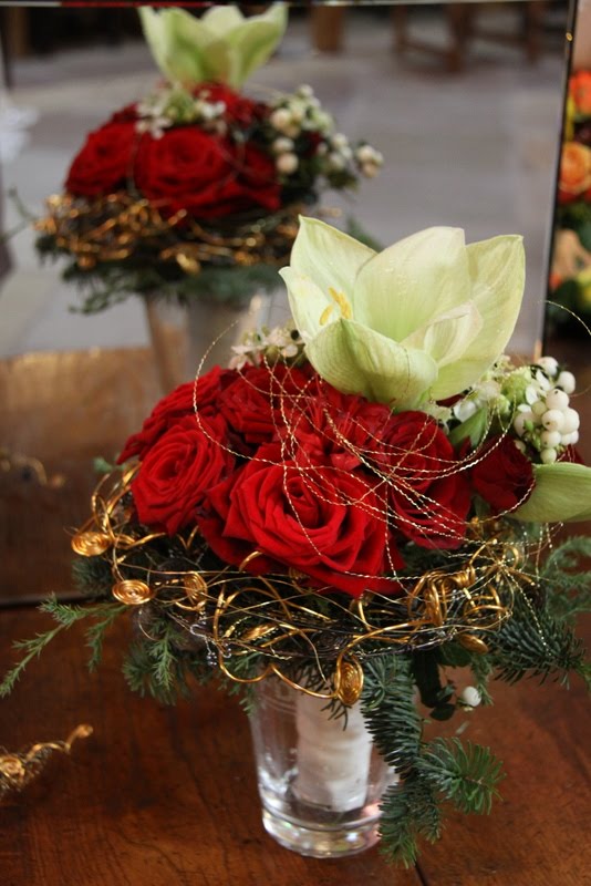 Wintery Wedding Bouquet of Amaryllis Snowberry and Grand Amore Roses