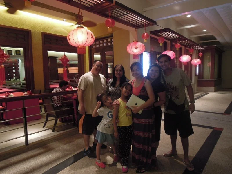 Family photo in front of Tea of Spring at Shangri-La's Mactan Resort and Spa