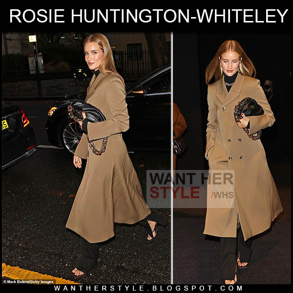 Rosie Huntington-Whiteley in long camel coat, black trousers and sandals