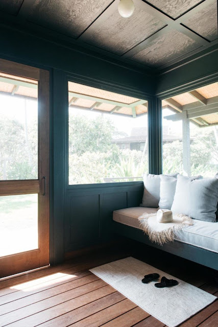 Window seat on porch of beautiful oceanfront cottage on Maui - found on Hello Lovely Studio