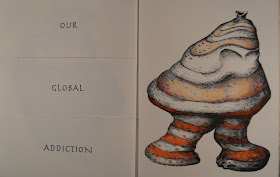 An open book. The lefthand page shows the text "Our global addiction" and the right shows a striped, lumpy creature with no discernible head.