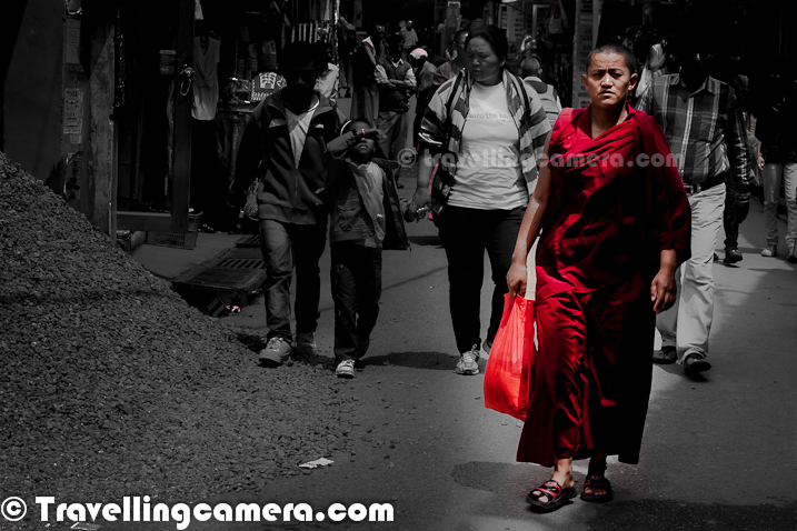 Few days back when Petrol prices were hiked in India, we started getting various jokes on our facebook wall. One of the joke was about the intelligence of Monk who sold his Ferrari. Suddenly I also thought of sharing this walking Monk in the streets of Mcledoganj town, which is in Himalayan State of India. Most of the streets of Mcledoganj can be seen with various Monks and Tourists roaming around. This photograph was clicked during one of my last trips to Mcledogaj and more can be seen at - http://phototravelings.blogspot.com/2012/05/walking-streets-of-mcledoganj-streets.html