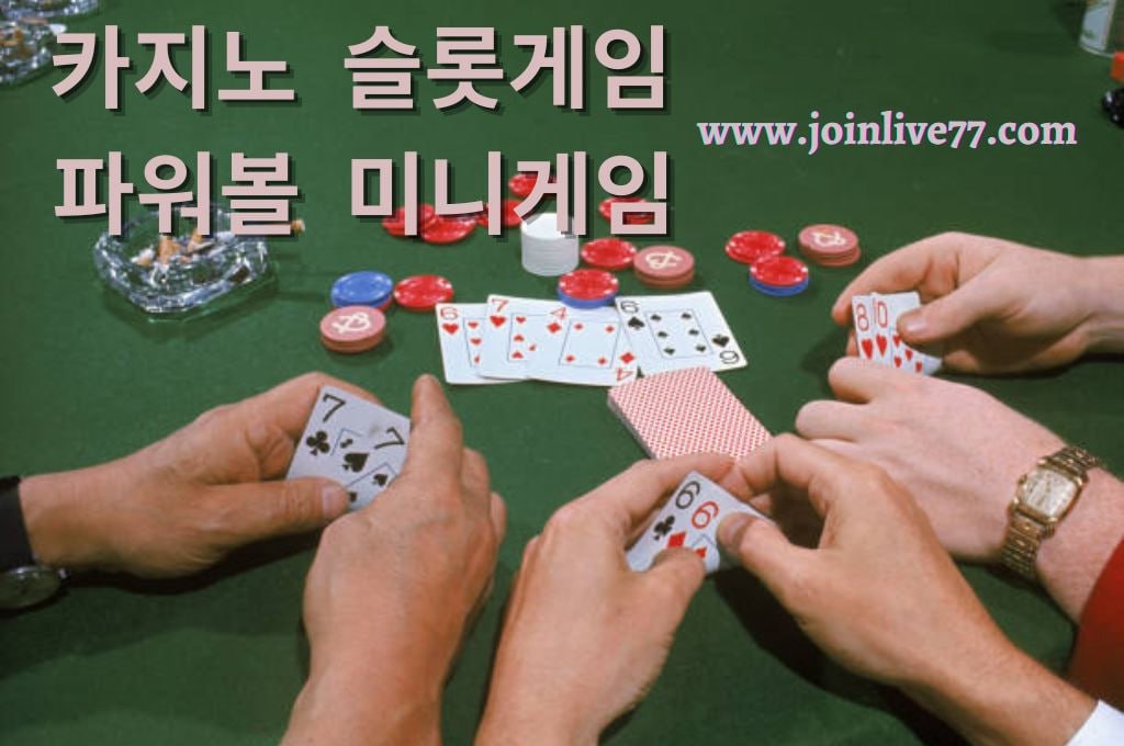 Two player's hand holding cards at the table game with chips.