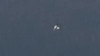 This is a large UFO or 3 UFOs over Nevada Desert.
