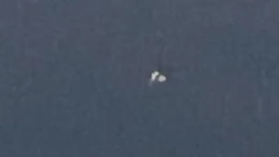 This is a large UFO or 3 UFOs over Nevada Desert.