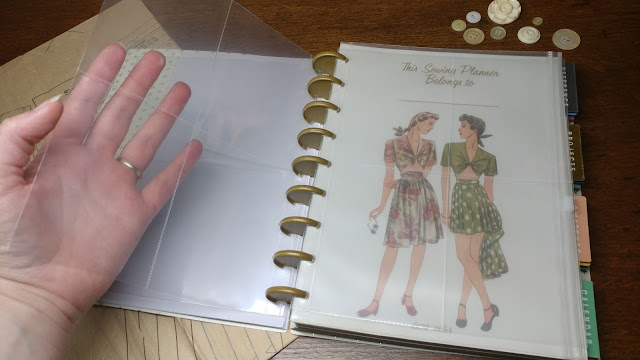 Clear pocket pages in a sewing planner