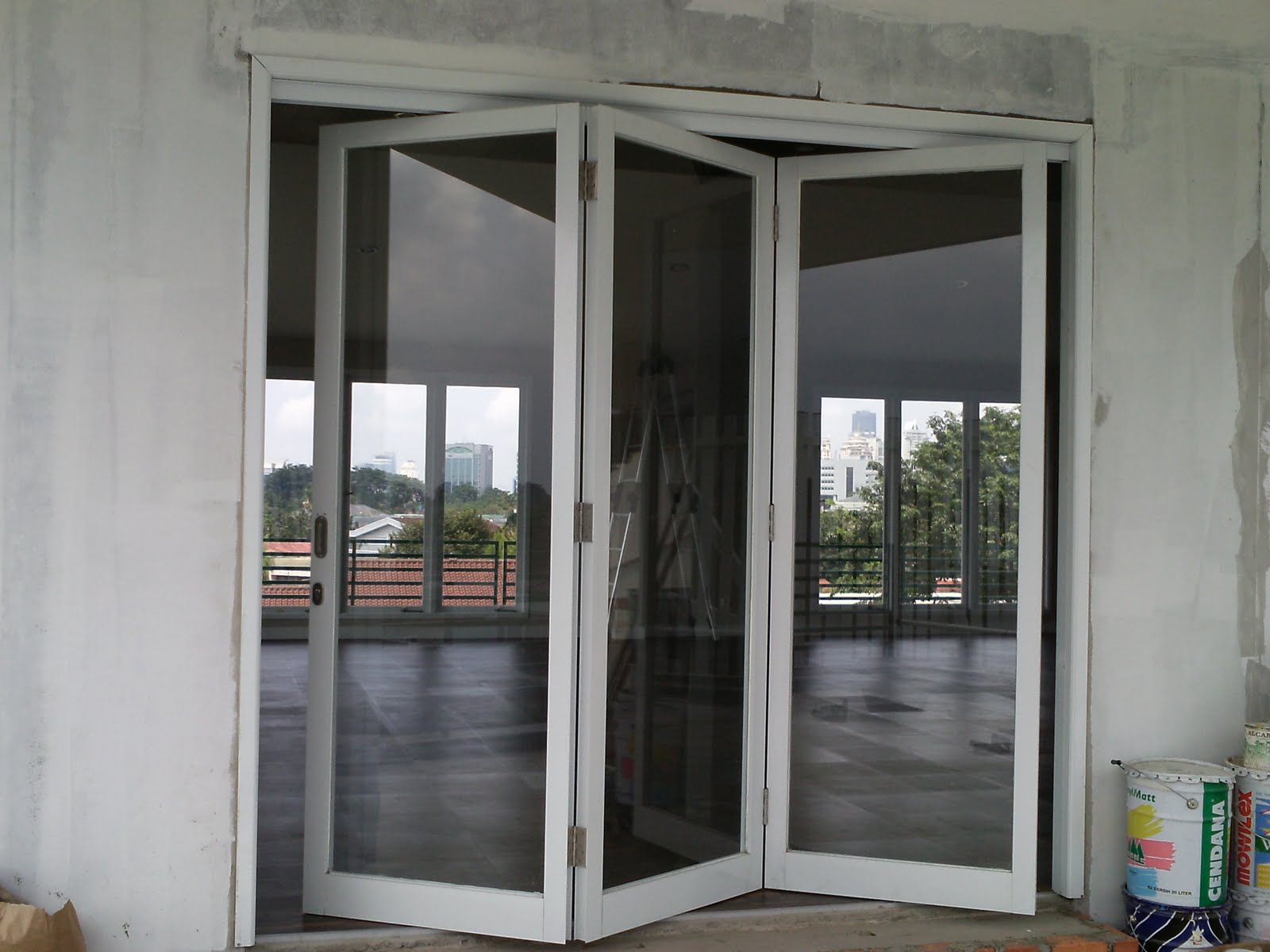 UTAMA ALUMINIUM  DAN KACA Kusen pintu  lipat as aluminium 