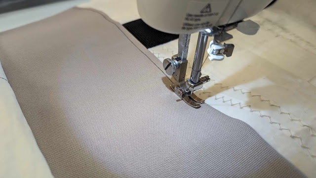 Top stitching on the canvas to reinforce the bottom seam