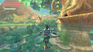 Link swimming in the flooded Faron Woods with the Great Tree in front of him