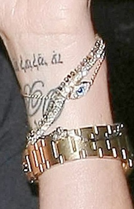Wrist band is usually knots celtic tattoo or barbed wire