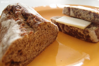 bread crumb view with slice of bread with cheese topping