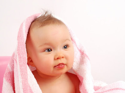 fotografia de bebe con toalla