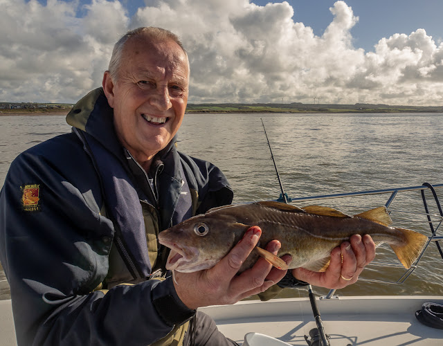 Photo of Phil with the largest cod he's caught from Ravensdale 