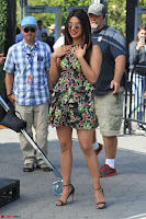 Priyanka Chopra looks super cute in happy mood wearing a short flower print dress in Hollywood 012.jpg