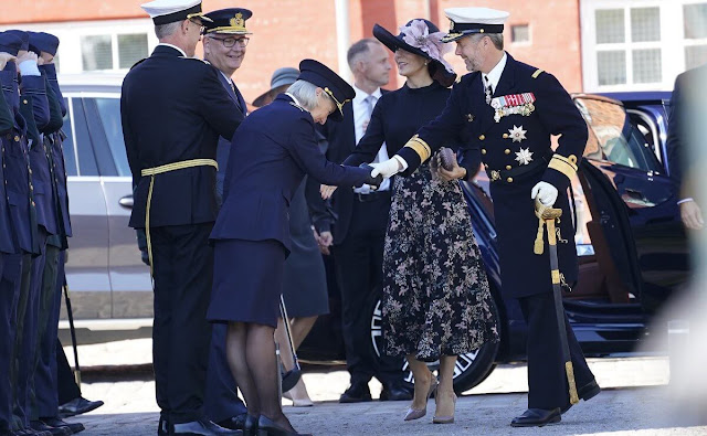Crown Princess Mary wore a Cilja black silk blend blouse by Hugo Boss. Andiata flower print maxi skirt