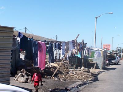 Drinking Umqombothi Xhosa Beer in Cape Town, Nyanga Township