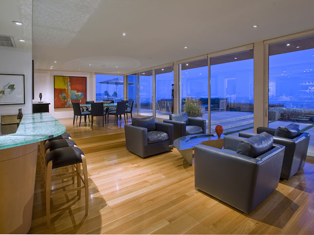 Picture of sitting area and round dining table in the modern mansion