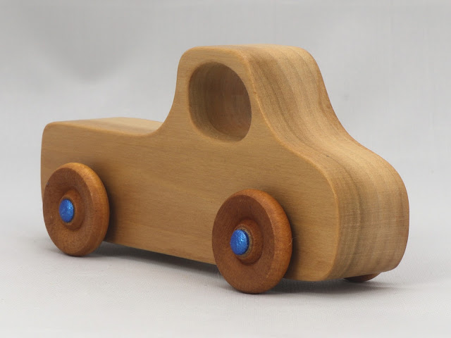 A Handmade Wood Toy Pickup Truck from the Play Pal Series Finished with Clear & Amber Shellac, Wax, and Metallic Blue Acrylic Paint