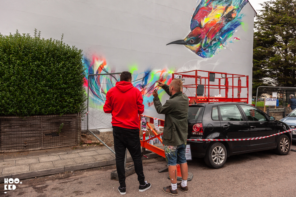 Brazilian street artists L7M paints bird mural in Cheltenham