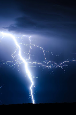 image of powerful lightning bolt in blue sky