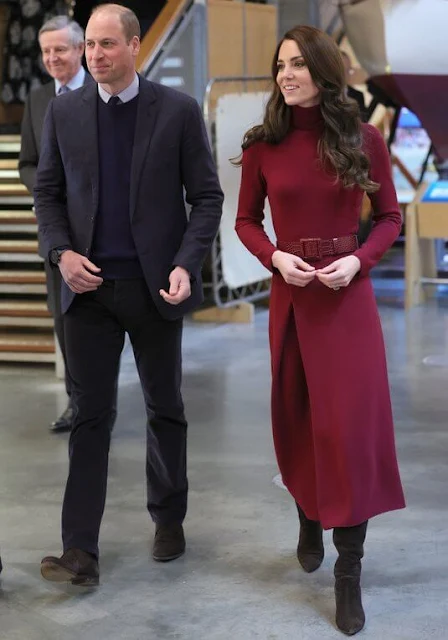 Prince of Wales wore a Celeste wool coat by Hobbs London, and she wore a crimson turtleneck sweater dress