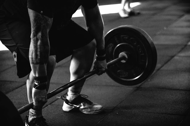 Man about to deadlift, bodybuilding, strength training