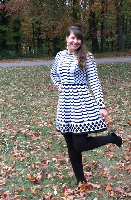 I am making a bold statement by pairing winter white and black together in a geometric print dress and wool coat. 