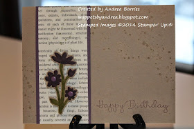 Crumb Cake card base with a panel of newsprint-style printed paper on the left side. On the printed paper is a die-cut and embossed flower colored with Perfect Plum and Old Olive.