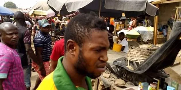 Photos: Outrage as youths storm market in Gboko, Benue and forcefully shaved young men with 