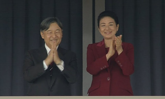 Empress Masako wore a wine red burgundy blazer suit, and ruby earrings. Tenno Sho Autumn Races in Fuchu City