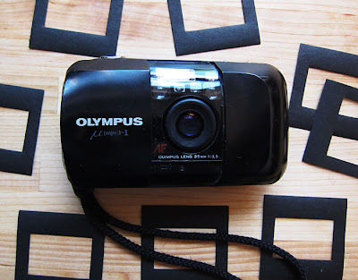 OLYNPUS POINT AND SHOOT CAMERA. Photograph by Tim Irving