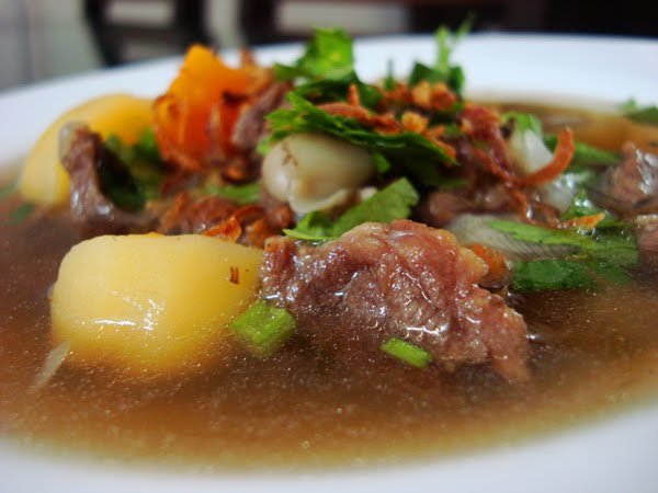 Dari Sebuah Sangkar Kecil: Sup Daging Pedas Masam